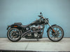 Radical Radius Exhaust - Black with Black End Caps. Fits Softail 2018up.