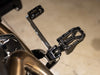 Aggressor Footpegs - Black. Fits Softail 2018up Front Rider