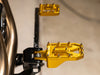 Aggressor Footpegs - Gold. Fits Softail 2018up Front Rider